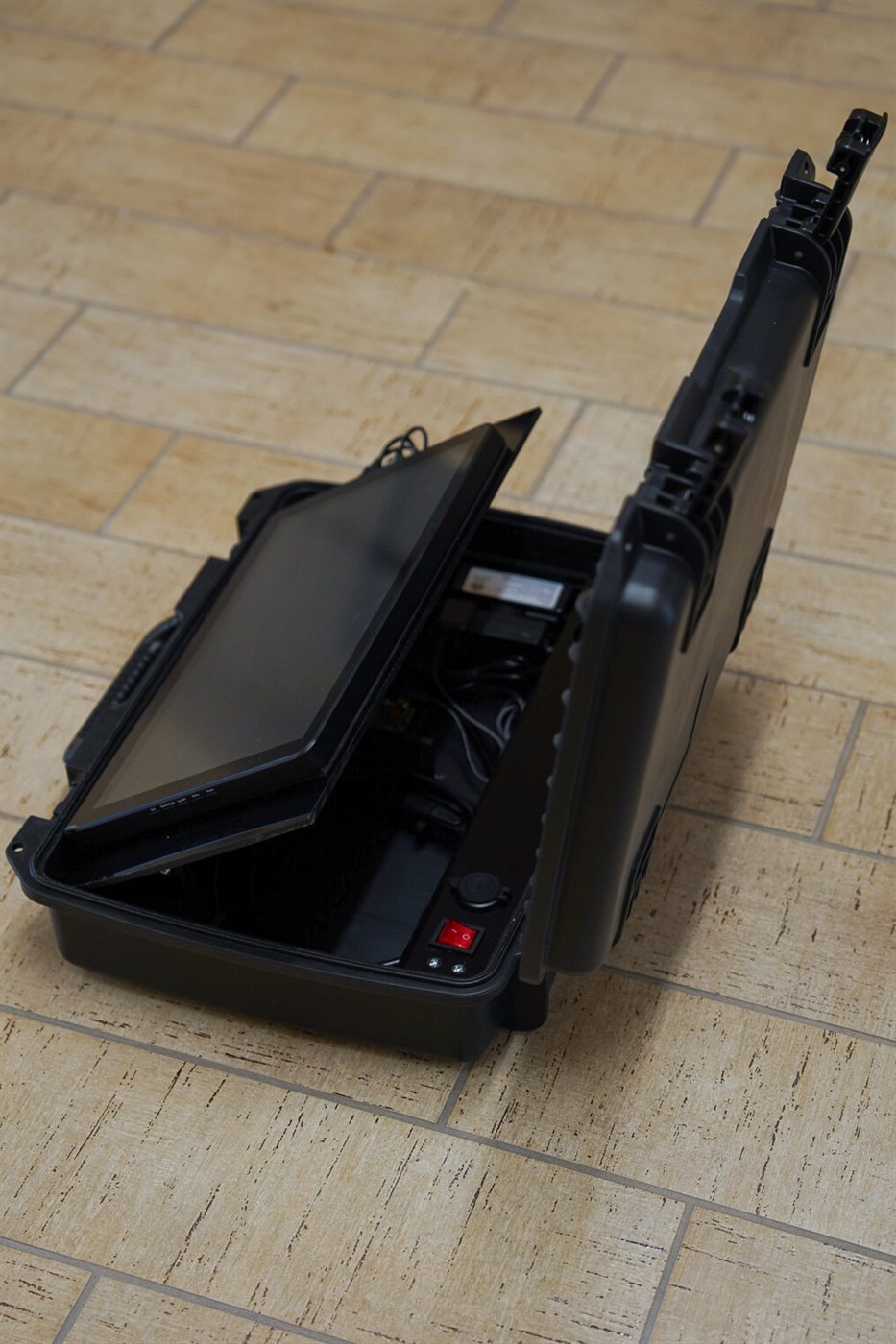 Side view of the simulator touchscreen and internal enclosure